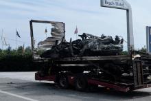 La carcasse carbonisée d'un camion dans lequel ont péri 11 migrants présumés le 13 octobre 2018 dans le nord de la Grèce.