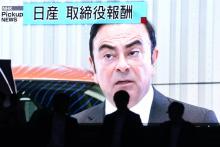Le portrait de Carlos Ghosn sur écran géant à Tokyo, le 20 novembre 2018