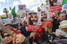 Des Tunisiens protestent contre la visite du prince-héritier saoudien Mohammed ben Salmane à Tunis le 27 novembre 2018