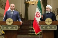 Photo fournie par la Présidence iraniene montrant le président iranien, Hassan Rohani, et son homologue irakien, Barham Saleh pendant une conférence de presse à Téhéran, le 17 novembre 2018