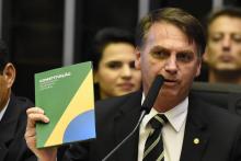 Le président-élu brésilien Jair Bolsonaro s'est engagé à respecter la Constitution devant le Parlement. Brasilia le 6 novembre 2018.