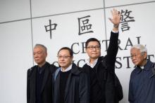 Chan Kin-man, 59 ans, professeur de sociologie, Benny Tai, 54 ans, professeur de droit et Chu Yiu-ming, 74 ans, révérend baptiste, fondateurs du mouvement "Occupy Central", le 3 décembre 2014 à Hong K