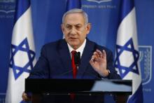 Le chef du gouvernement israélien Benjamin Netanyahu se rend au Conseil des ministres hebdomadaire à Jérusalem, le 18 novembre 2018