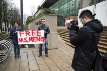 Deux personnes demandent la libération de la dirigeante de Huawei Meng Wanzhou, le 10 décembre 2018 à Vancouver