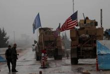 Des véhicules militaires américains à la base de Manbij en Syrie le 30 décembre 2018
