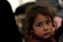 Une fillette syrienne en larmes au camp de déplacés d'Al-Hol, dans le nord-est syrien, le 8 décembre 2018