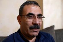 Un haut responsable kurde de Syrie, Aldar Khalil, le 22 décembre 2018 lors d'un entretien avec l'AFP à Qamishli (nord)
