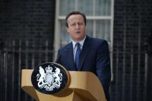 David Cameron fait une déclaration devant le 10 Downing Street avant d'aller présenter sa démission à la reine Elizabeth II, le 13 juillet 2016 à Londres