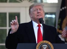 Le président américain Donald Trump annonce qu'il va signer un texte pour mettre fin temporairement au shutdown, le 25 janvier 2019 à la Maison Blanche, à Washington
