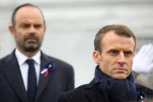 Le président français Emmanuel Macron devant le Premier ministre Edouard Philippe le 11 novembre 2018 à Paris
