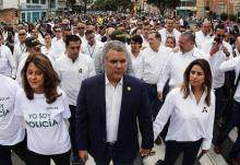 Le président colombien Ivan Duque et son épouse manifestent à Bogota contre le terrorisme le 20 janvier 2019 après l'attentat à la voiture piégée revendiqué par l'ELN