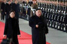 Photo de l'agence KCNA de Kim Jong Un, accompagné de son épouse Ri Sol Ju, quittant la gare de Pyongyang pour la Chine, le 7 janvier 2019