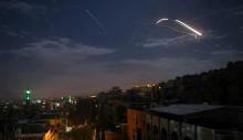 Une photo montrant la défense anti-aérienne syrienne entrer en action contre des missiles israéliens, selon les médias d'Etat syriens, le 21 janvier 2019 au-dessus de Damas