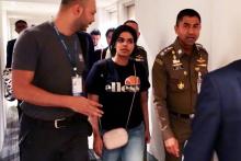 Photo fournie par les services de l'immigration thaïlandais le 7 janvier 2019 montrant la jeune Saoudienne Rahaf Mohammed al-Qanun à l'aéroport international de Bangkok