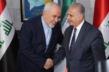 Le minitsre irakien des Affaires étrangères, Mohammad Ali al-Hakim (à droite) reçoit son homologue iranien Mohammad Javad Zarif à Bagdad, le 13 janvier 2019