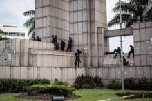 La police aux abords du siège de la Commission électorale nationale indépendante (Céni), le 9 janvier 2019 à Kinshasa