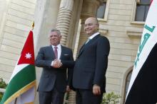 Le roi Abdallah II de Jordanie (G) et le président irakien Barham Saleh (D), le 14 janvier 2019 à Bagdad