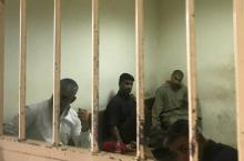 Des détenus dans une prison de Bagdad, la capitale irakienne, dont un jihadiste belge connu sous le nom d'Abou Hamza al-Belgiki (D), le 10 mai 2018