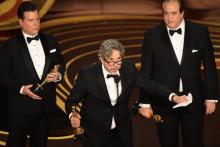 Nick Vallelonga (D), Brian Currie (G) et Peter Farrelly (C), scénaristes et réalisateur de "Green Book", sacré "meilleur film" aux Oscars 2019
