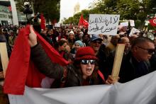 Des Tunisiens manifestent à Tunis le 8 décembre 2017 contre un éventuel retour au pays des jihadistes, qui représenterait selon eux une "grande menace" pour la sécurité nationale