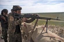 Des combattants des Forces démocratiques syrienens (FDS), une coalition arabo-kurde soutenue par la coalition internationale lors de leur offensive contre un dernier réduit du groupe jihadiste Etat is