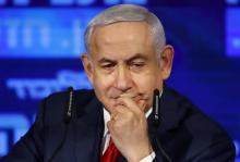 Le Premier ministre israélien Benjamin Netanyahu prononce un discours durant le lancement de sa campagne pour les élections d'avril au QG de son parti Likoud à Ramat Gan, une banlieue de Tel-Aviv, le 