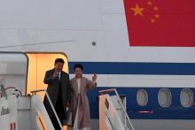 Le président chinois Xi Jinping et sa femme Peng Liyuan à leur arrivée à l'aéroport de Fiumicino, près de Rome, le 21 mars 2019