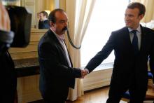 Le secrétaire général de la CGT, Philippe Martinez (g), reçu à l'Elysée par le président Emmanuel Macron, le 12 octobre 2017