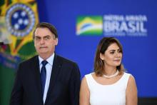 Le président brésilien Jair Bolsonaro (g) et son épouse Michelle Bolsonaro, le 5 avril 2019 à Brasilia