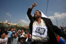 Des colons israéliens de Hébron, en Cisjordanie occupée, portent en triomphe une des figures de la droite radicale israélienne Itamar Ben Gvir, le 21 mars 2019