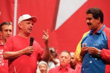 Hugo Carvajal (g) aux côtés du président vénézuélien Nicolas Maduro, le 27 juillet 2014 à Caracas