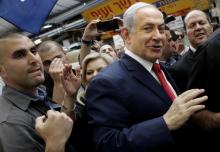 Combinaison de photos du Premier ministre israélien Benjamin Netanyahu (D), le 10 mars 2019 à Jérusalem, et de son principal rival, le général Benny Gantz (G), le 1er avril 2019