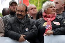 Le secrétaire général de la CGT Philippe Martinez (G) lors d'une manifestation le 9 mai 2019 à Paris