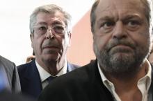 Mayor of Levallois-Perret Patrick Balkany (L) and his deputy mayor wife (unseen) arrive with their layer Eric Dupond-Moretti (R) at Paris courthouse on May 13, 2019 as they are being prosecuted for tw
