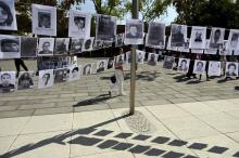 Des photographies de personnes disparues exhibées à Mexico au cours de la manifestation des mères, le 10 mai 2019