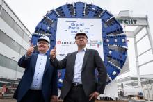 Martin Herrenknecht (g) et Thierry Dallard, à la tête du Grand Paris, devant un tunnelier de l'atelier allemand, le 20 mai 2019