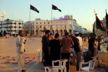 des Libyens rompent ensemble le jêune du ramadan sur la place des martyrs à Tripoli le 15 mai 2019