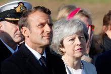 Le président Emmanuel Macron et la Première ministre britannique Theresa May lors des célébrations du 75e anniversaire du Débarquement en Normandie, le 6 juin 2019 à Ver-sur-Mer