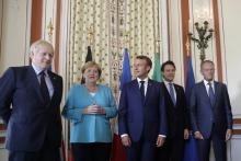 Le Premier ministre britannique Boris Johnson, la Chancelière allemande Angela Merkel, le Président français Emmanuel Macron, le Premier ministre démissionnaire italien Giuseppe Conte, et le Président
