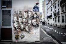 Portraits des journalistes de Charlie Hebdo tués le 7 janvier 2015, sur un mur près des anciens locaux du journal satirique
