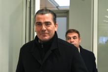 Frédéric Chatillon, proche conseiller de Marine Le Pen, et Axel Loustau (en arrière plan) au Tribunal de Grande Instance de Paris), à l'ouverture du procès, le 6 novembre 2019