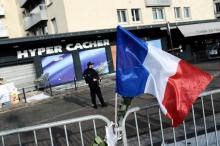 Le 21 janvier 2015 devant le magasin Hyper Cacher de Paris où le terroriste Amedy Coulibaly a tué quatre otages le 9 janvier