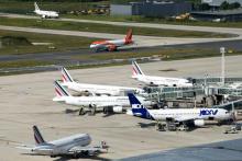 Des avions de différentes compagnies aériennes sur le tarmac de l'aéroport de Roissy-Charles-de-Gaulle, le 27 juin 2019