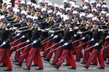 Des élèves du lycée militaire de Saint-Cyr l'Ecole lors du défilé sur les Champs-Elysées, le 14 juillet 2019 à Paris