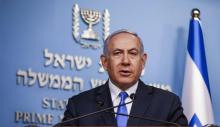 Le Premier ministre israélien Benjamin Netanyahu s'exprimant lors d'une déclaration télévisée dans son bureau à Jérusalem le 3 avril 2019, sur la récupération par Israël du corps d'un soldat porté dis