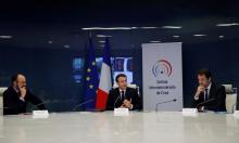 Emmanuel Macron (C), Christophe Castaner (D) et Edouard Philippe (G) lors d'un point presse au ministère de l'Intérieur à Paris le 20 mars 2020