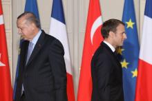 Les présidents turc Recep Tayyip Erdogan (G) et français Emmanuel Macron lors d'une conférence de presse conjointe à l'Elysée, le 5 janvier 2018 à Paris