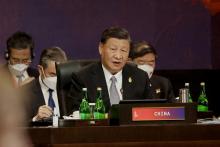 China's President Xi Jinping attends a session during the G20 Summit in Nusa Dua on the Indonesian
