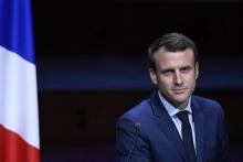 Emmanuel Macron devant l'Association des maires de France à la Maison de la radio à Paris, le 22 mar