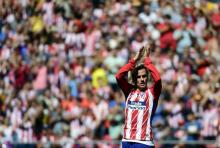 L'attaquant français de l'Atletico Antoine Griezmann fête un but contre le Séville FC, à Madrid le 2
